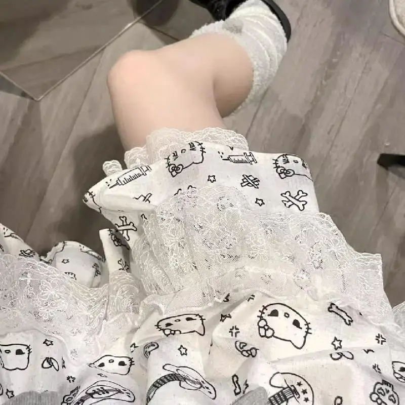 سانريو مرحبا كيتي أنيمي Kawaii الصيف اليابانية طباعة تنورة دعوى المرأة لطيف البسيطة مطوي التنانير الجديدة Y2K الدانتيل موضة الحلو مجموعة