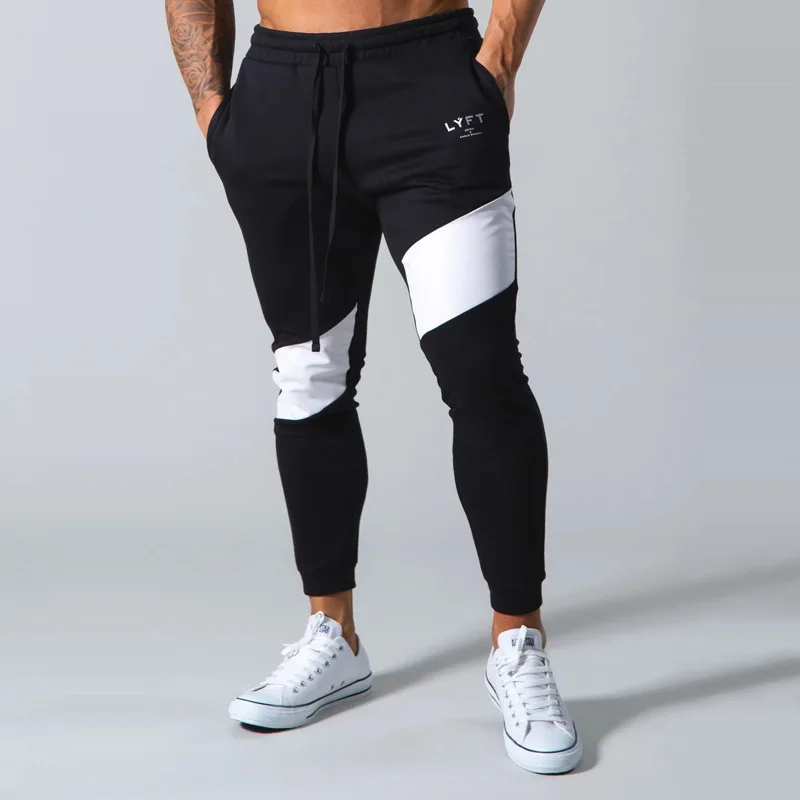 Nuovi pantaloni Fitness lavorati a maglia a due colori con cuciture di tendenza pantaloni sportivi Casual da basket pantaloni sportivi a matita