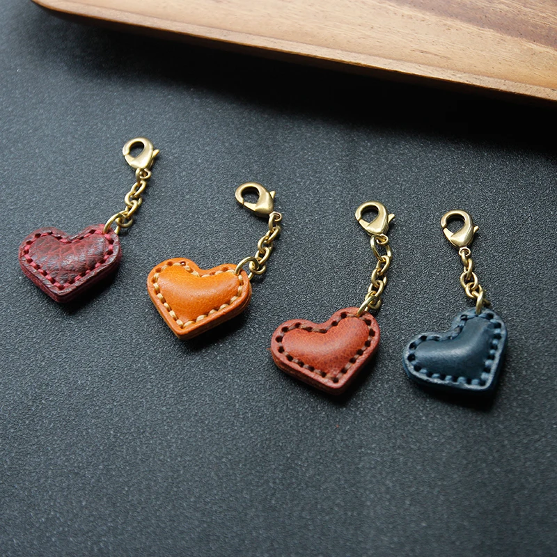

Original handmade leather heart-shaped car key pendant cute money bag pendant mobile phone case leather pendant exquisite gift