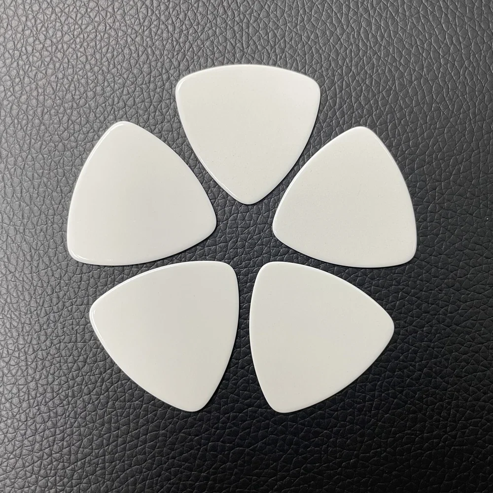 Lots of 100pcs White 0.46mm /0.71mm/ 0.96mm /1.2mm Big Rounded Triangle ABS Guitar Picks