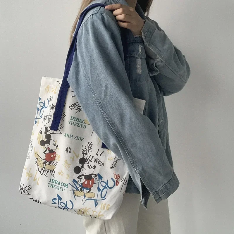 Disney cartoon płócienna torba damska na jedno ramię nowa Mickey Tote studenckie graffiti duża pojemność mała torebka torby Crossbody