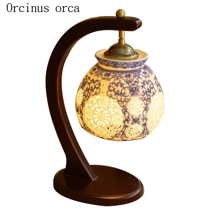 New Chinese classical hollow led ceramic table lamp bedroom bedside lamp American Pastoral creative solid wood desk lamp