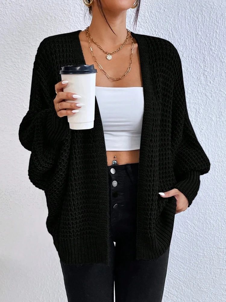 

Solid color knitted sweater with V-neck mid length hollowed out cardigan sweater women's top fashionable and elegant