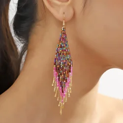 Rice bead earrings Tassel Originality Dazzling Hand knitting Bohemia Alloy Fashion Simple Beaded earrings
