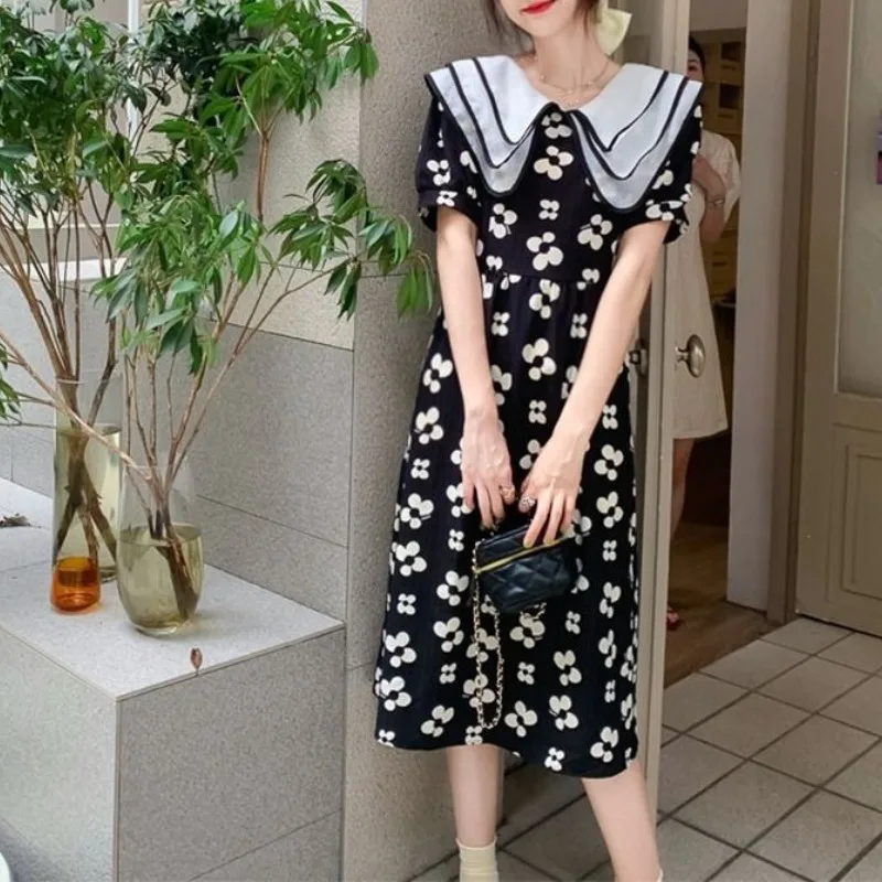 

Retro Loose Fitting Pullover Doll Neck Women's 2024 French Summer New Patchwork Printed Fashionable Casual Short Sleeved Dress