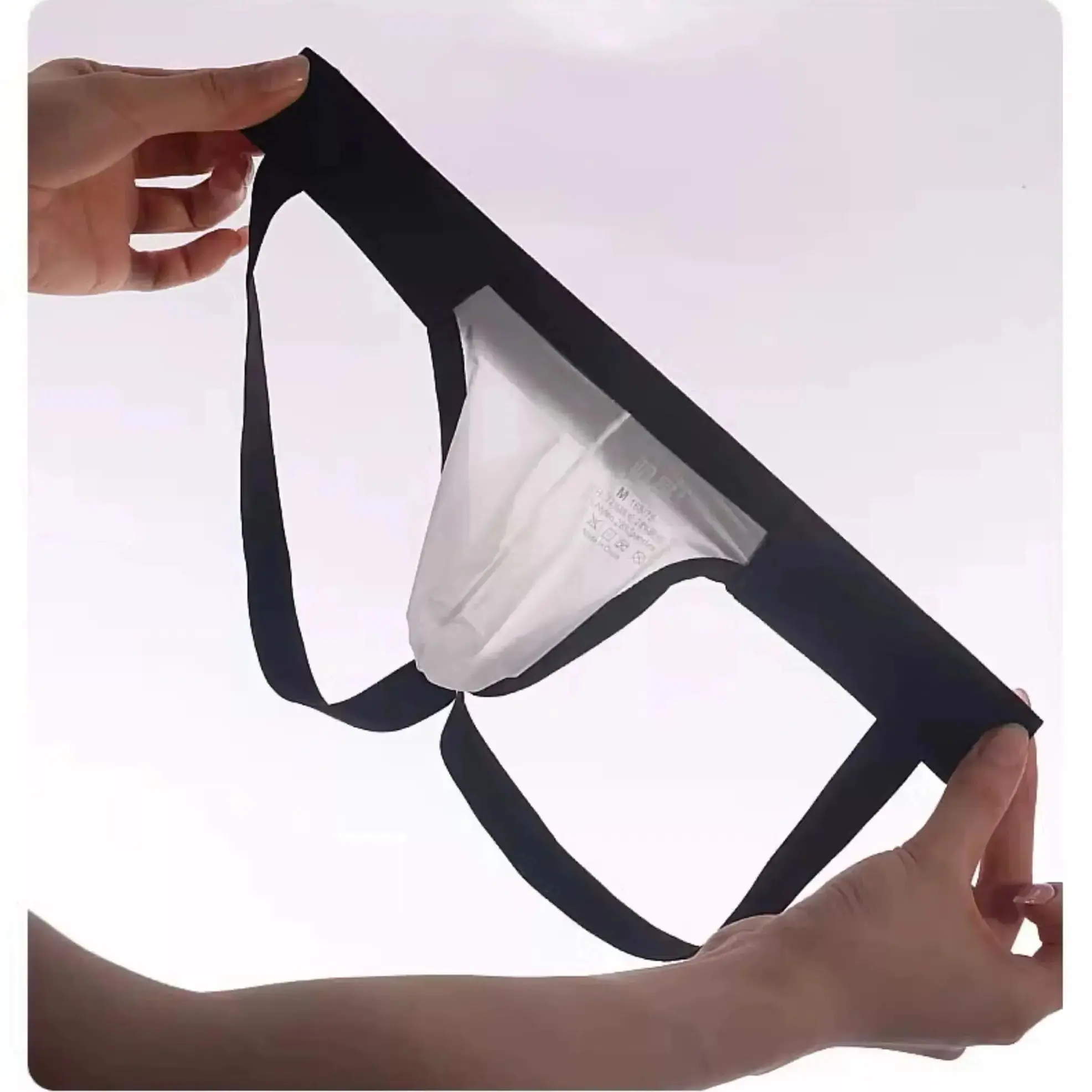 Underwear men's thongs fully transparent T-pants ultra-thin ice silk men's fun low waisted slim fitting T-pants A1990