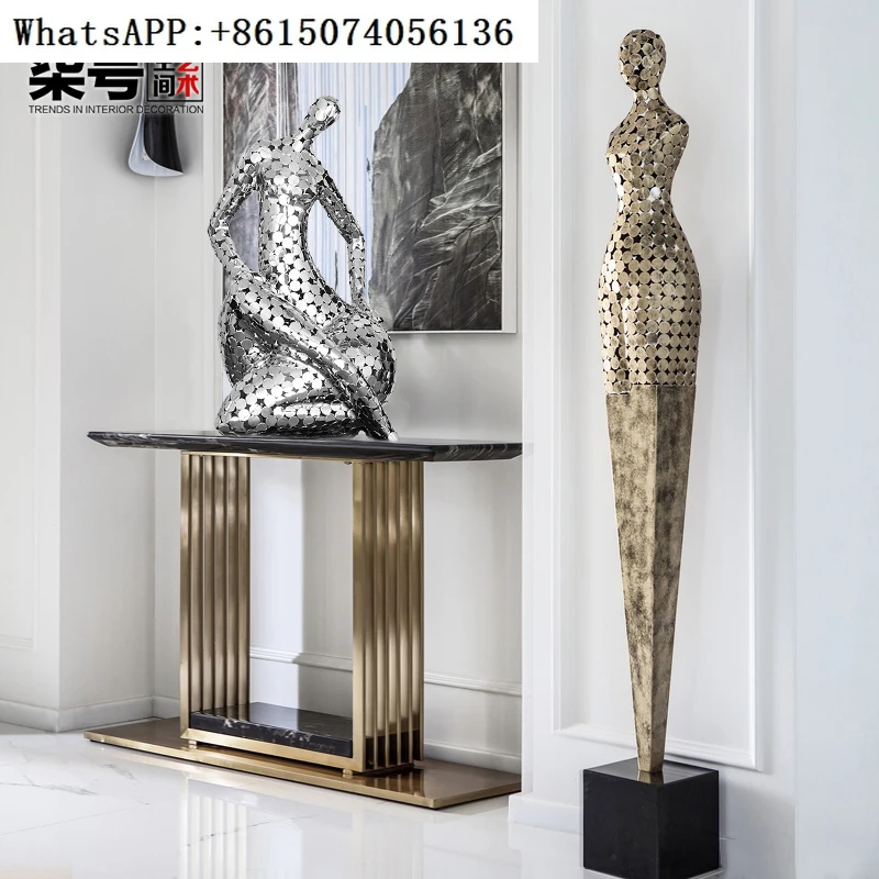 Light luxury mermaid shaped floor decorations in the hotel lobby, abstract figures, iron sculptures, living room art decorations