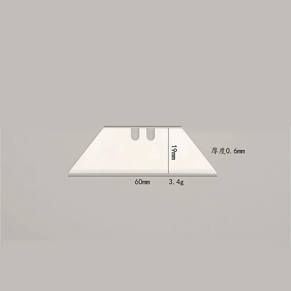 5 ceramic insulated trapezoidal blades that are rust free and non-magnetic for carpet cutting, paper cutting, and edge trimming