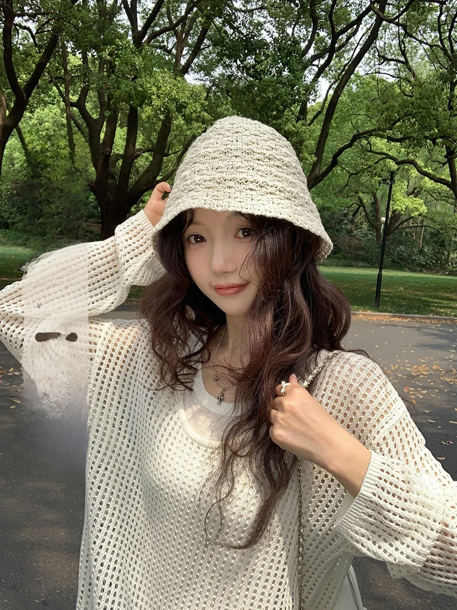 

Комплект из двух предметов: льняной ажурный вязаный топ с длинными рукавами и свободный жилет-майка Ibell Zhang Tianli. Модный летний женский комплект.