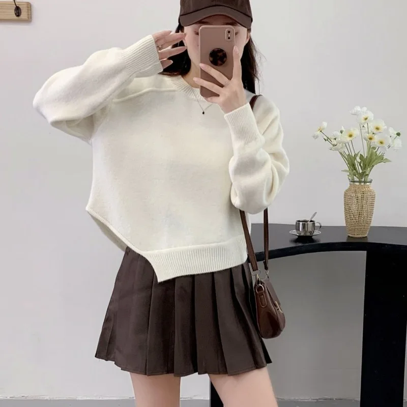 

Round neck knitted sweater for women in autumn and winter, new loose and stylish short style solid color sweater design sense