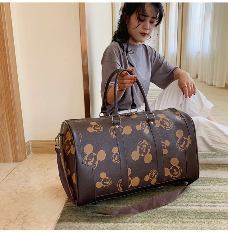 Disney-bolso de viaje de Mickey para hombre y mujer, bolsa de equipaje de gran capacidad, bandolera de un solo hombro, novedad de 2023