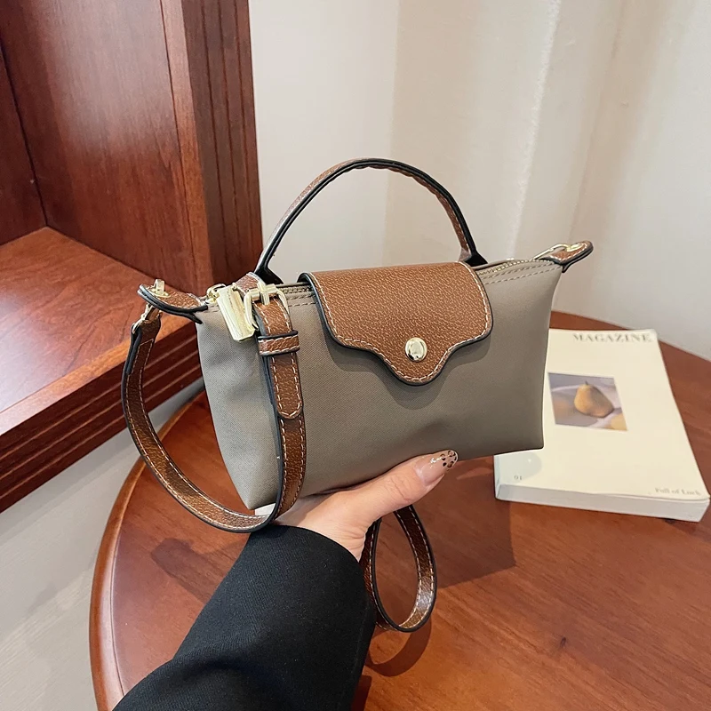 

Popular Ladies Handbag With Leather Handles - Elegant Tote Style Crossbody Option By Famous Luxury Brand