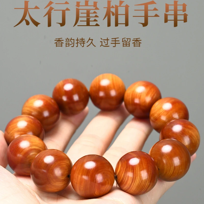 

Подлинный браслет из кипарисового нефрита Taihang Cliff, имитирующего сахарное сердце, с выдержанными красными полупрозрачными бусинами Будды 2.0, высокой маслянистостью