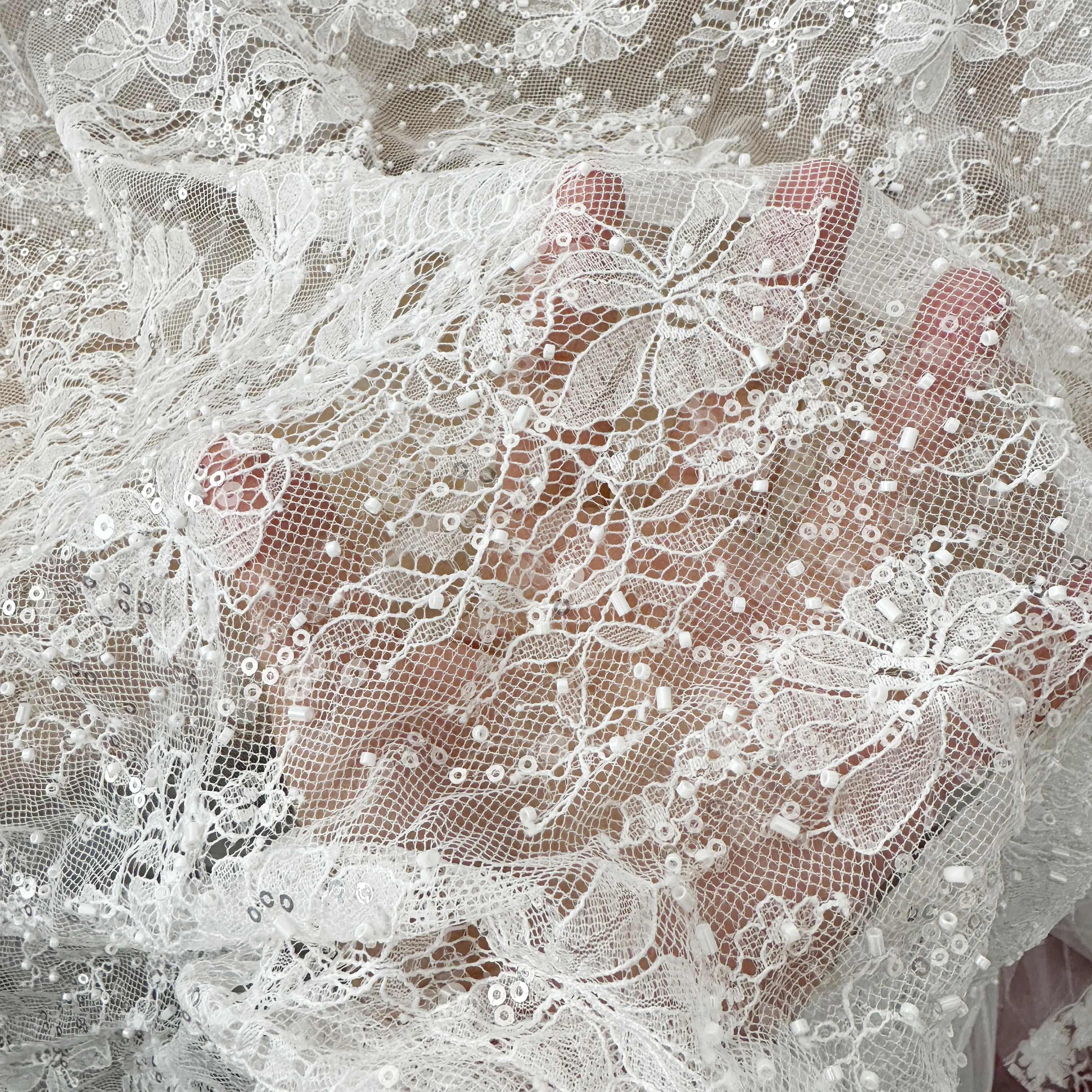 

New High Quality Lace Fabric Is Used As The Base for Wedding Dresses, Including Single Strand Beads and Sequins Accessories
