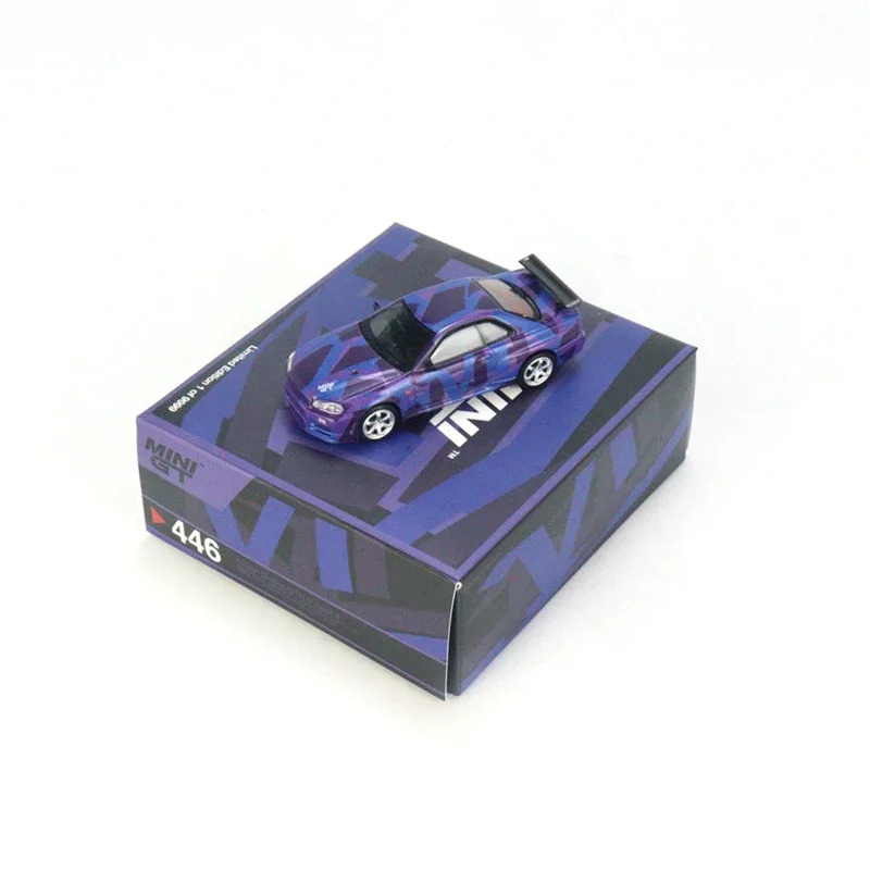 MINI GT 1:64 Nissan Skyline GT-R (R34) V-Spec II Digital Camouflage Purple  5 Years Anniversary Model RHD MGT00446-R racing car