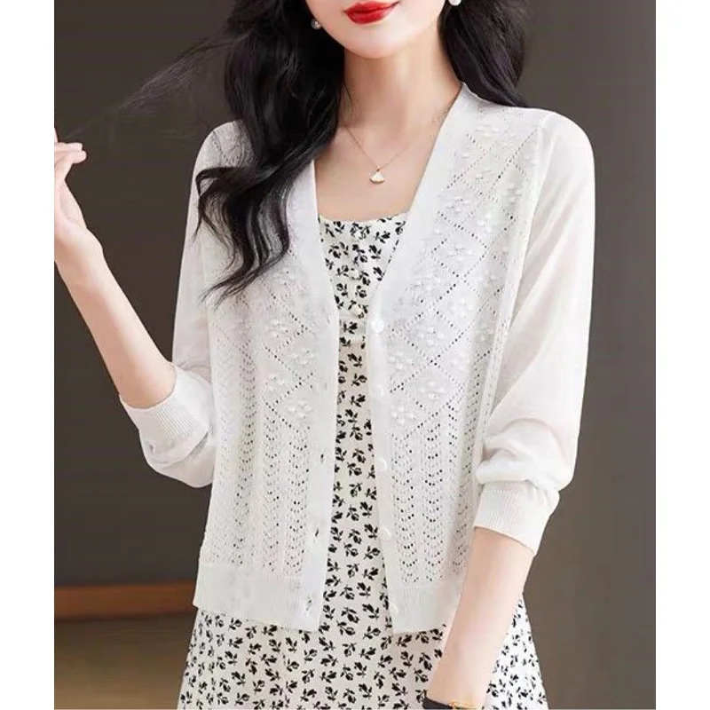 2024 New Summer Minimalist Commuting Casual Loose Fashion Trend V-neck Hollowed Out Jacquard Solid Color Three Quarter Sweater