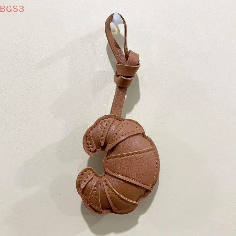 الإبداعية اليدوية متعدد الطبقات التصحيح الكرواسون الحبل المفاتيح الأمتعة قلادة حقيبة صغيرة