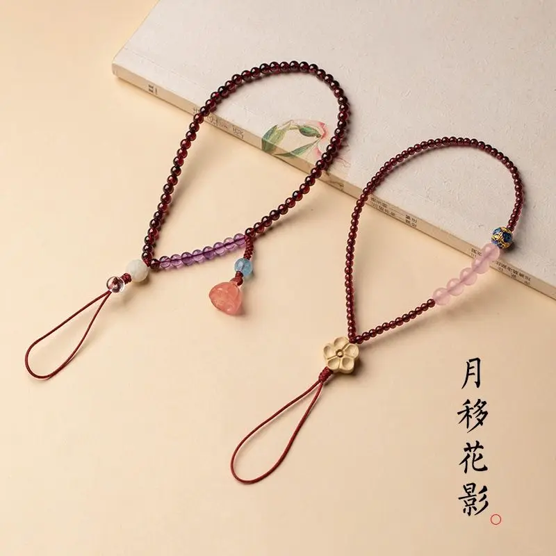 

Qiongrui original natural claret Garnet cellphone chain high-end wrist lanyard female artistic crystal pendant life