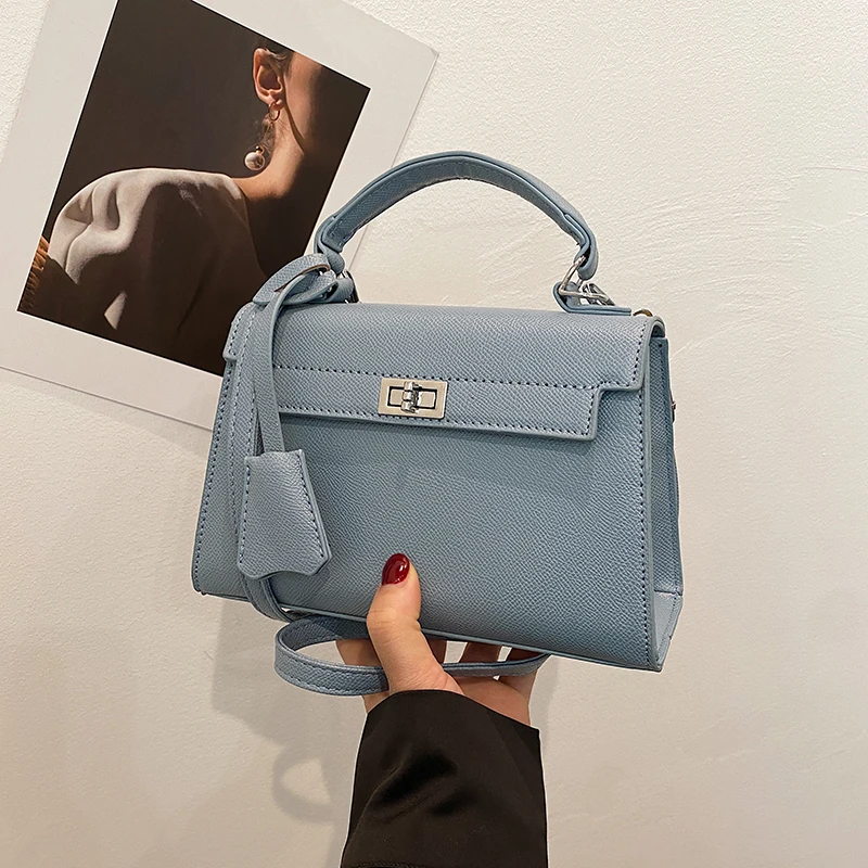 

Минималистичная стильная сумка-кошелек однотонного цвета с простым винтажным дизайном для повседневных женщин