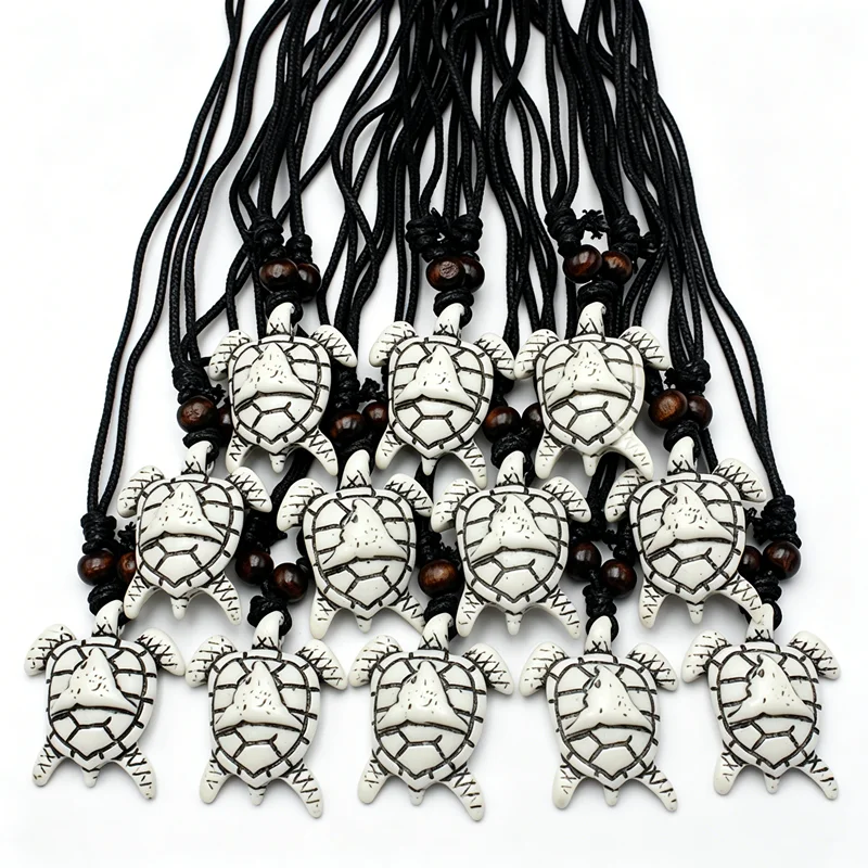 RUEMOY 12Pcs Abstract Face Totem Turtle Necklaces, Resin Faux Bone, 2 Colors, Adjustable Black Beaded Cord Hawaiian Jewelry