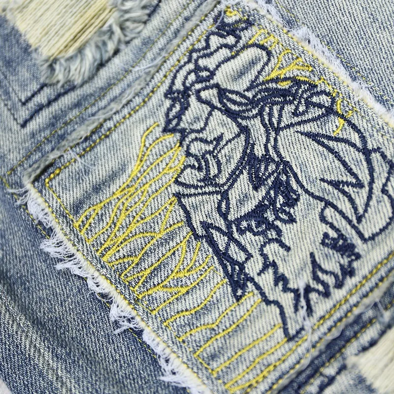 男性、ヒップホップファッション、ヴィンテージデザイナーのデニムパンツ、男性のパンクロックy2kパンツ、青のための折りたたまれたストリートプリントジーンズ