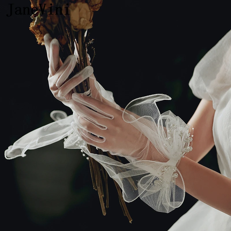 Janevini 2024ถุงมือประดับมุกแบบใหม่สำหรับเจ้าสาว, ถุงมือเจ้าสาวสีขาวผ้าตาข่ายบางถุงมือเจ้าสาวอุปกรณ์เสริมงานปาร์ตี้ mariage Femme