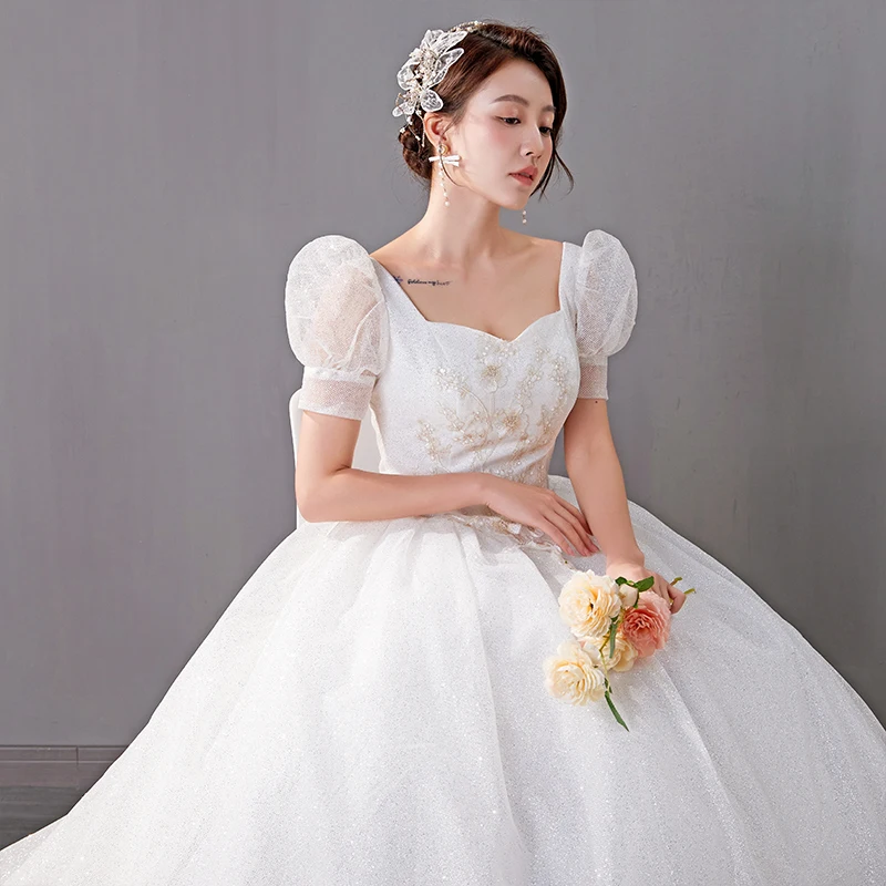 

Elegant Simple One-Shoulder Wedding Dress Floor-Length Tulle Short plus Size Bridal Gown Dreamy Fairy Tale Style for Brides