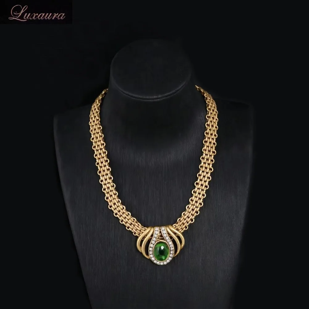 

Vintage jewelry featuring a fashionable and classic gold geometric necklace design paired with Bohemian style women's necklace