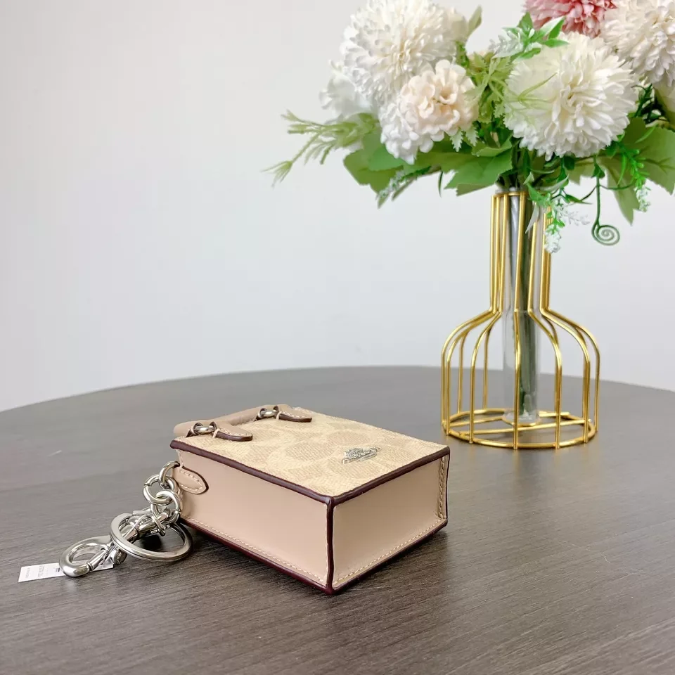 الشمال/جنوب حقيبة صغيرة سلسلة مفاتيح سحرية للنساء سحر لحقائب اليد حقيبة أنيقة قلادة صغيرة ل أكياس المدرب محفظة اكسسوارات