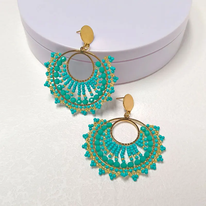 

Beaded earrings Circle Hollow out Originality Crystal Double-deck Hand knitting Bohemia Alloy Tide Simple Rice bead earrings