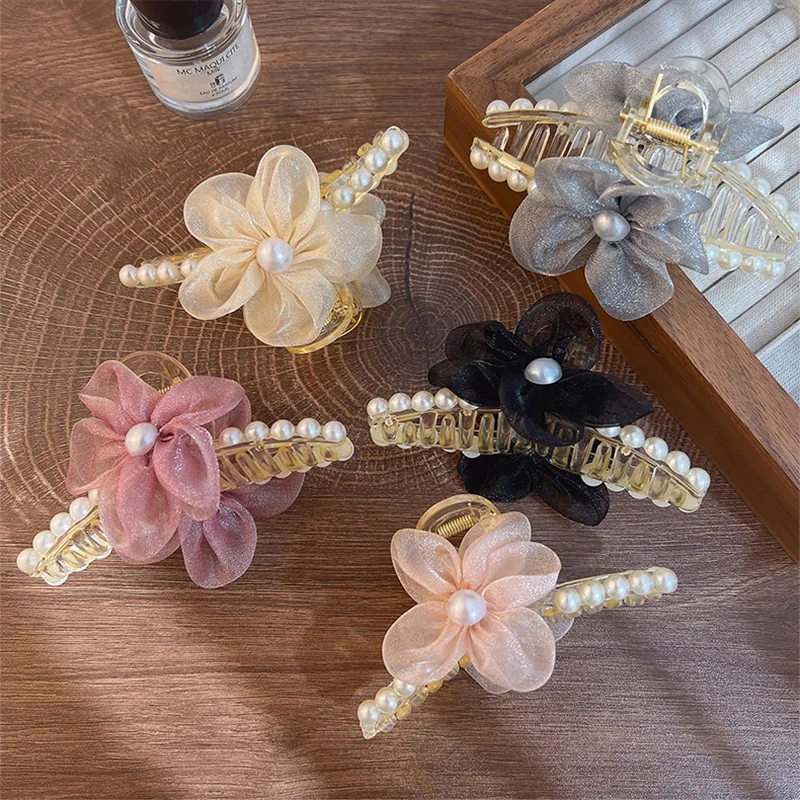

Flower hair clip, women's back of the head clip, large hair volume, multiple strands, high-end temperament, shark clip