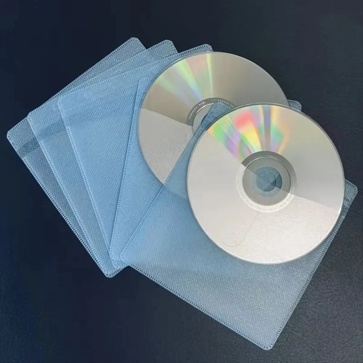 100 Pcs Dual-Sided CD/DVD Collection Set Scratch- Dust-Proof Storage Colorful CD Slot Bag Green