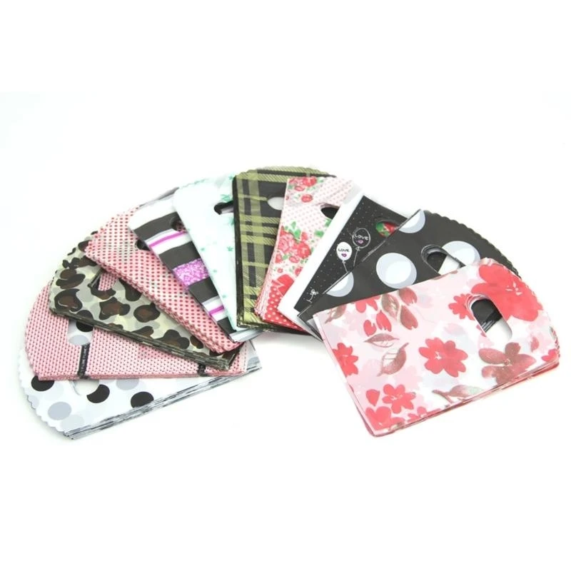 F92B Petits sacs en plastique Ensemble 50 points fleur fleur conception conception cadeaux délicats