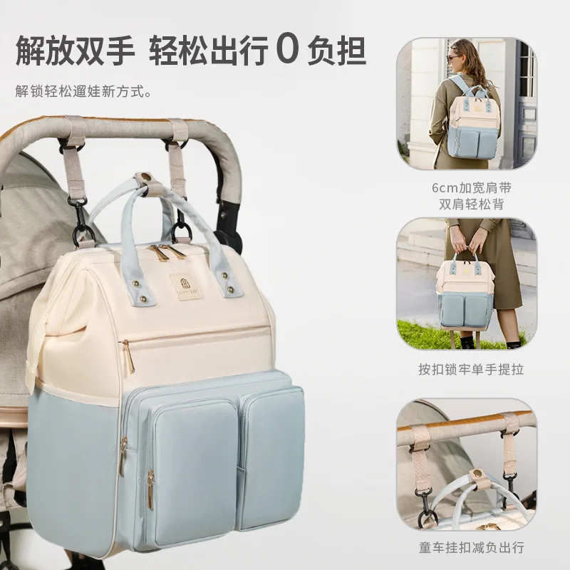 حقيبة الأم الجديدة كبيرة الحجم حقيبة الأم والطفل العصرية للفصل الجاف والرطب حقيبة الأم ذات الفتح الكبير