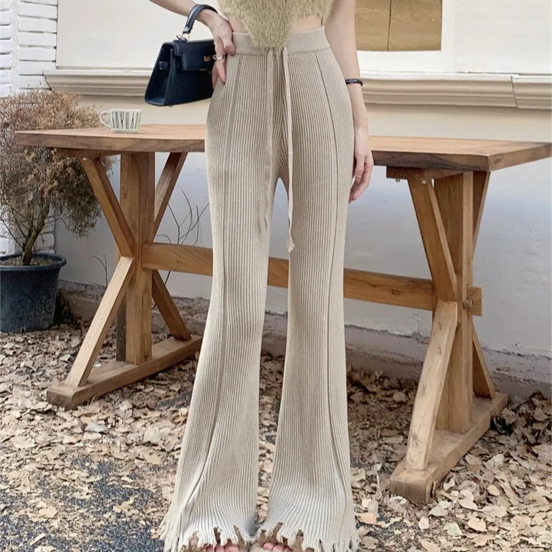 Dzianinowe spodnie codzienne Thiened na zimę, nowe, wyszczuplające, lekko rozszerzane, długie spodnie z frędzlami dla kobiet, z wysokim stanem.