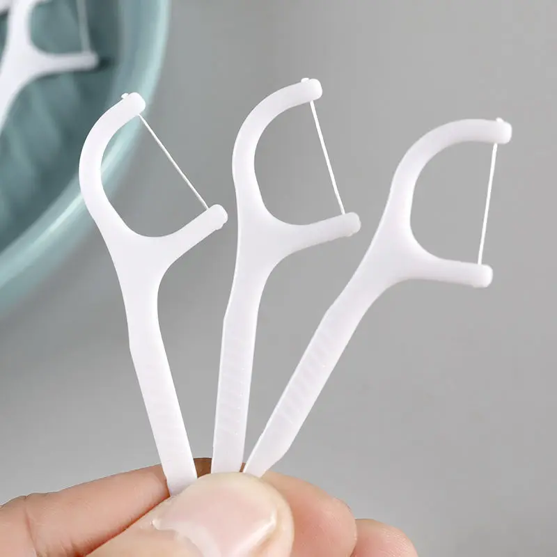 50PCS/Box Portable Disposable Dental Floss Pick Superfine Plastic Toothpick High-tension Tooth Floss Box Cleaning Oral Care