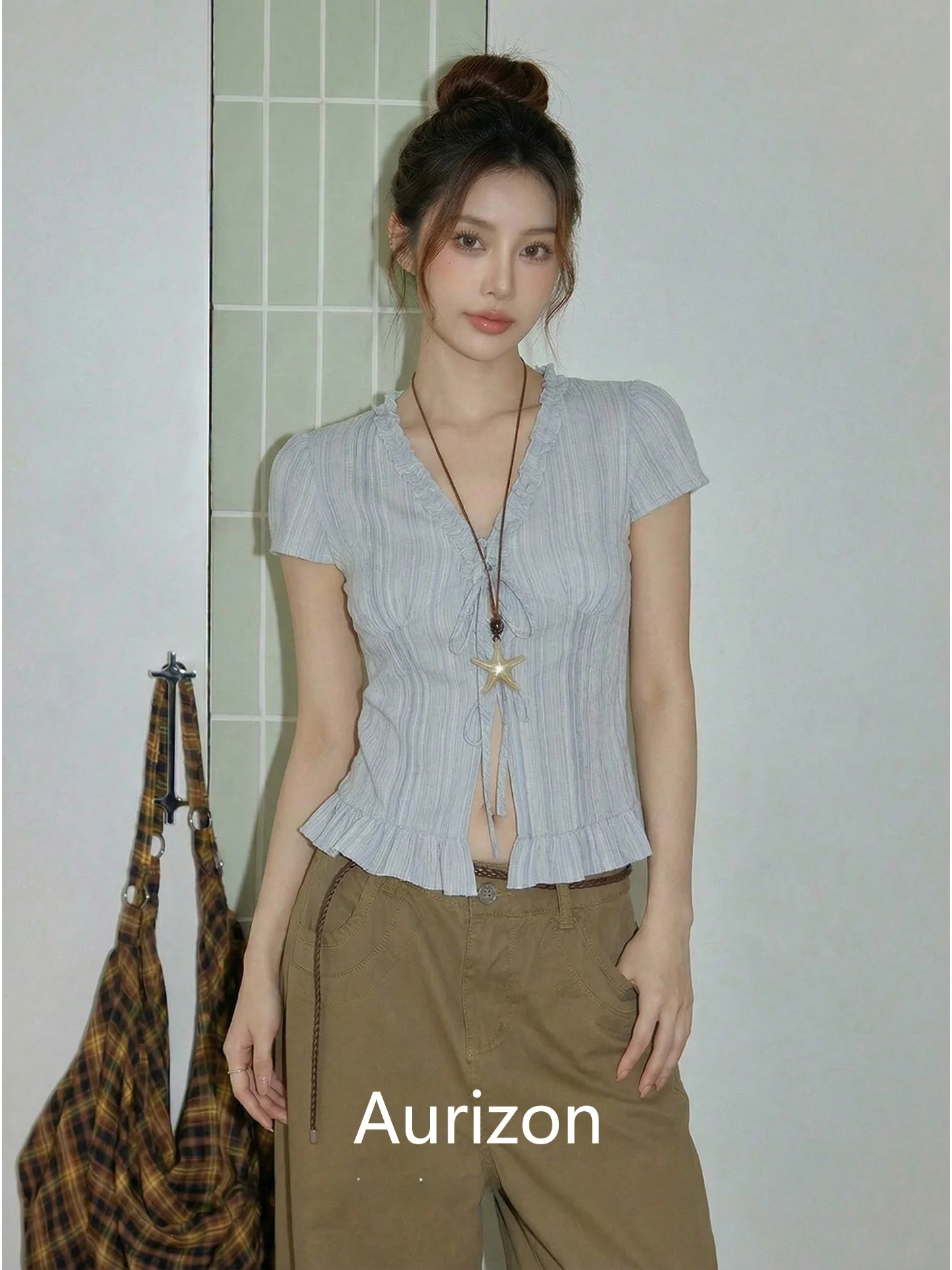 Summer 2026 Women's V-neck Striped Short-sleeve Shirt Sweet Slimming Small-market Polyester Fiber Casual Commute Style Blouse