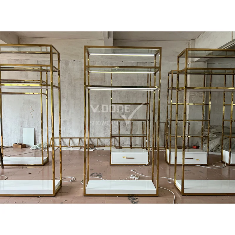 custom.Fashion Boutique Store Layout Hanging Garment Display Rack Golden Clothes Display Stand For Women Clothing Store Furnitur