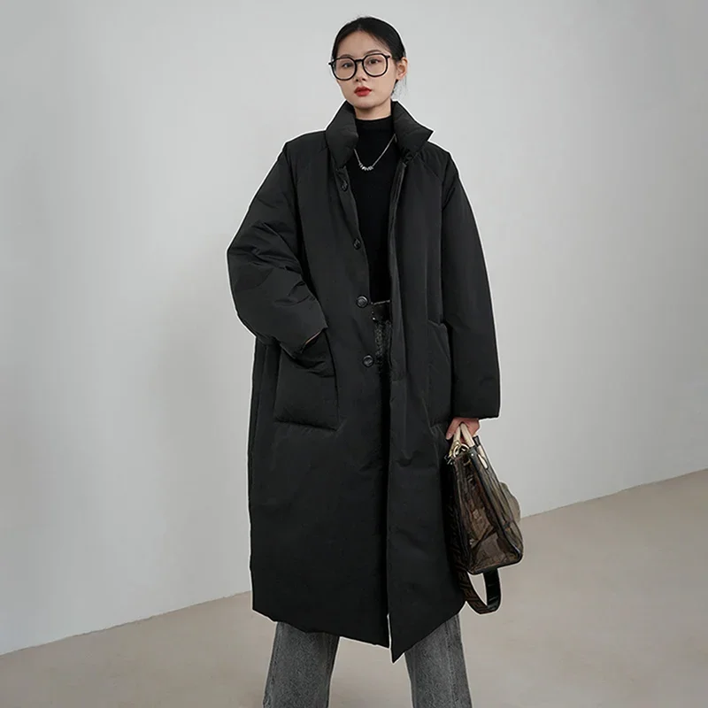 2025年冬 ロング丈 中綿コート レディース トレンド オーバーサイズ ゆったり スタンドカラー パーカー 女性らしい気質 ボタン付き 大きめポケット ジャケット
