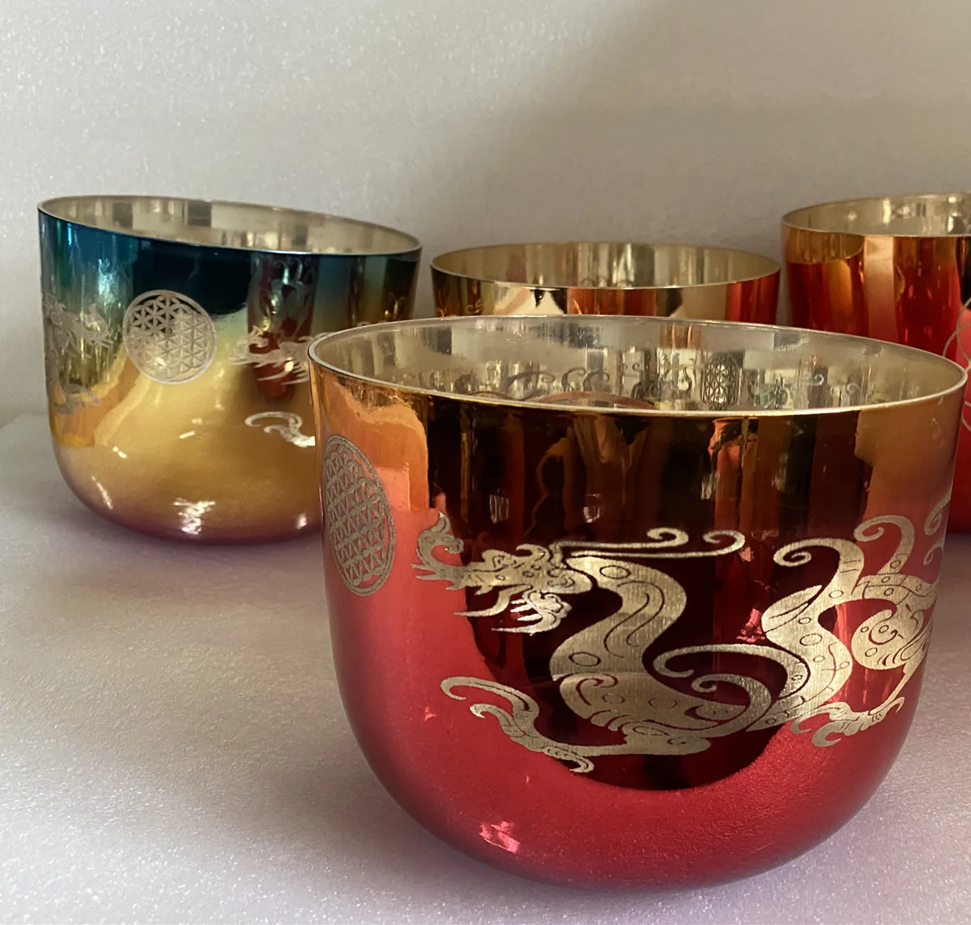 Any one of the shinny mixed color bowls with China dragon engraving 3rd octave B note crown chakra 432Hz for sound healing.