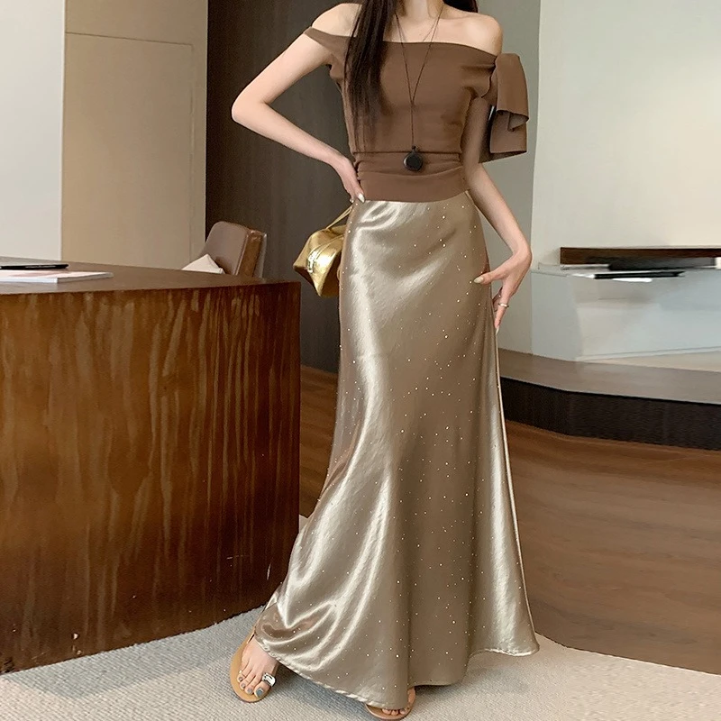 

Новинка 2026 года: Летняя юбка миди А-силуэта из ацетатного атласа с завышенной талией, французский дизайн с стразами, облегающий крой