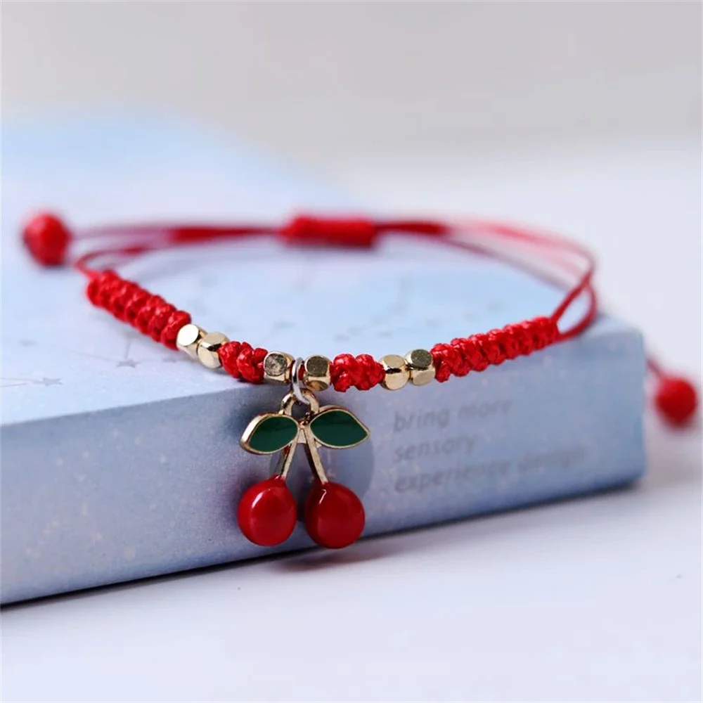 Pulseras de cereza y fresa tejidas a mano, joyería de amistad de cuerda roja bonita para niñas, accesorios colgantes de fruta dulce, regalos de moda