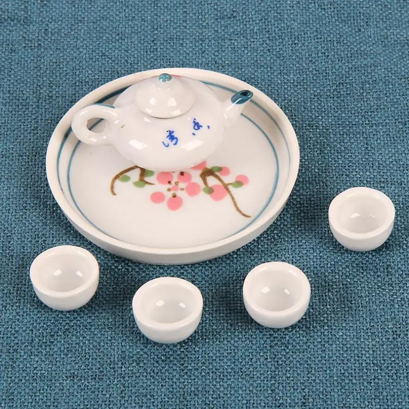 Ensemble de thé en céramique avec un adorable éléphant bleu clair, comprenant 3 petites tasses et un plateau de service, idéal pour le thé de l’après-midi, un cadeau pour les enfants ou pour décorer la maison.