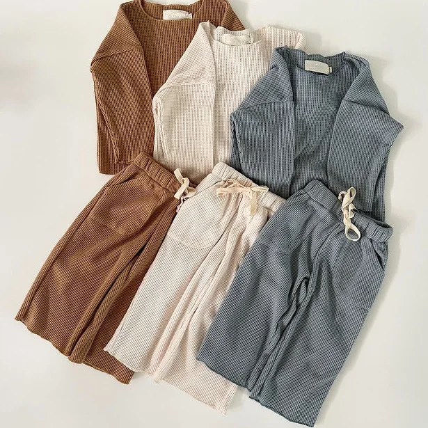

2025 ins Nordic Spring and Autumn Children's Knitted Waffle Comfortable T-Shirt + Wide Leg Pants, Casual Sports Two-piece Set