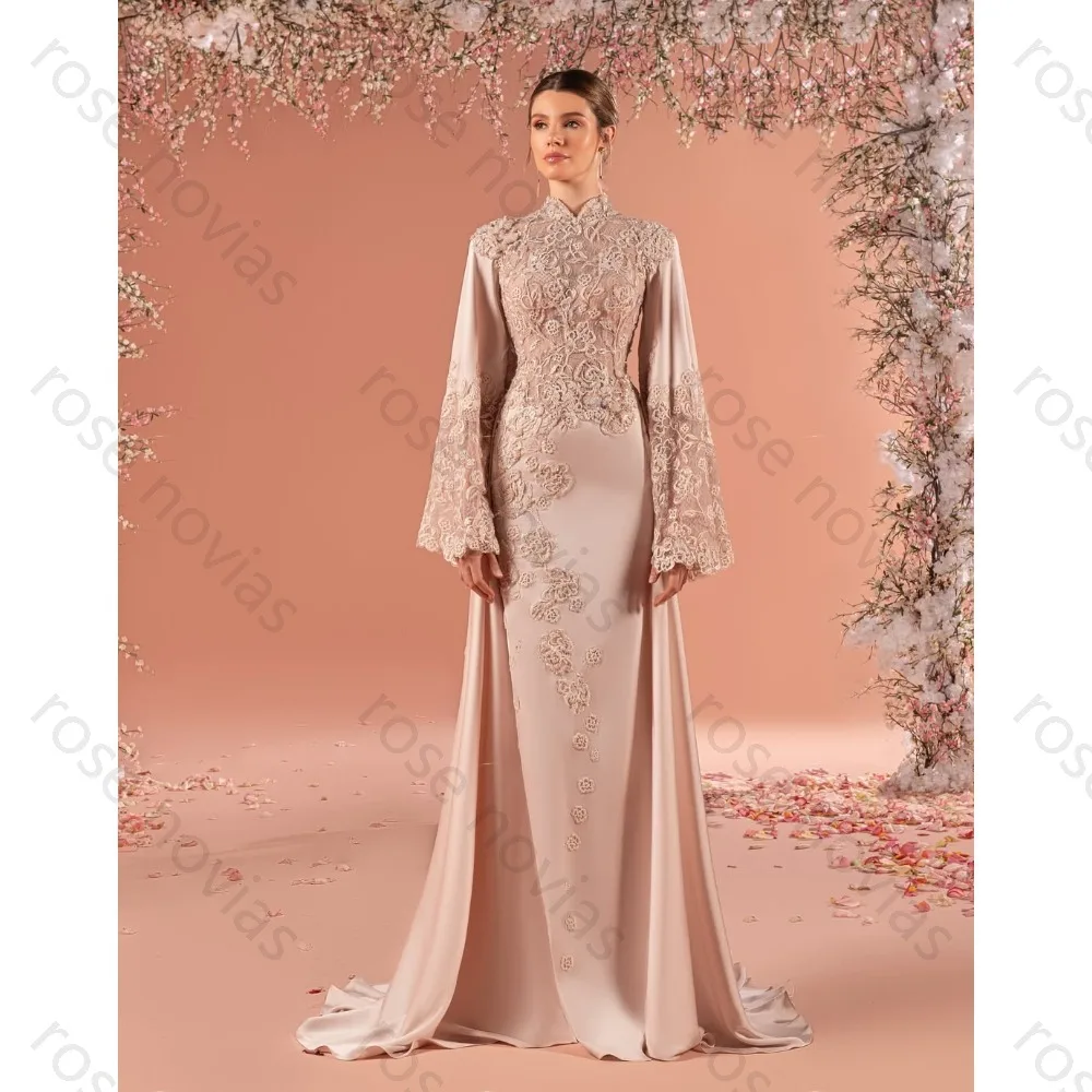 

Customized Blush Pink Formal Modest Evening Gown with High Neck Lace Embellishments Long Bell Sleeves and Satin Side Overlay