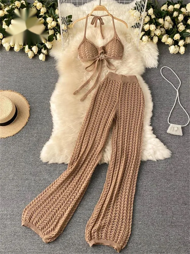 

Женский летний вязаный комплект: сексуальный топ-халтер с открытой спиной + шикарные ажурные вязаные брюки с широкими штанинами, комплект из двух предметов