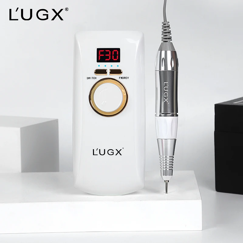 

L'UGX Custom Logo Professional 30000 rpm Wireless Nail Drill Machine Cordless Electric Rechargeable Portable Nail Drill