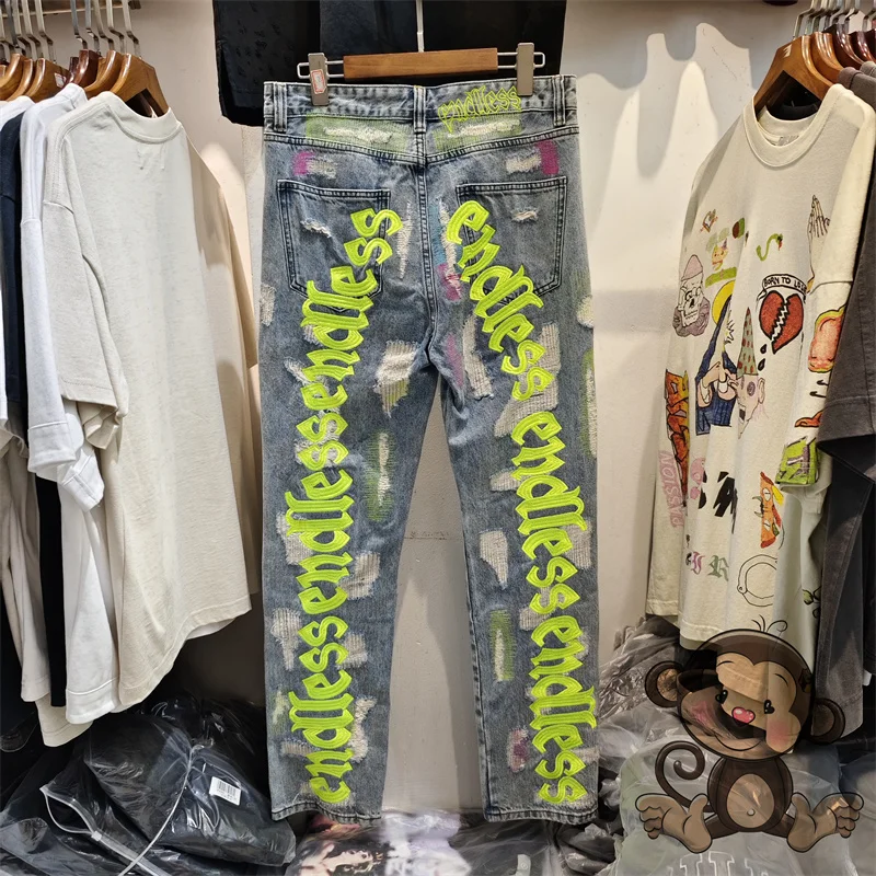 

High quality fabric fluorescent green endless letter embroidery loose hip-hop men's ripped jeans