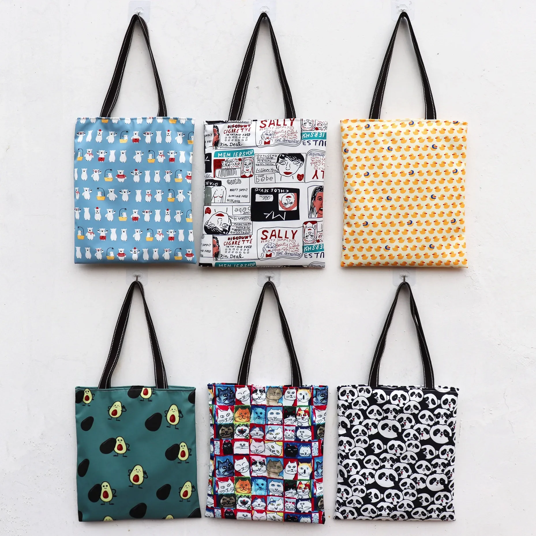 

Factory Direct Snoopy Waterproof Lightweight Student Shoulder Bag Ring Shopping Load Book Bag Men and Women Cartoon Graffiti