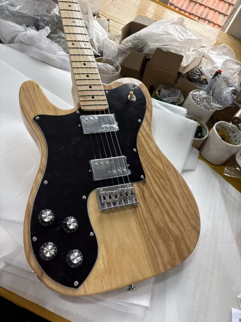 Left-hand 6-string electric guitar, maple neck and fretboard, natural color body, solid wood quality, free delivery